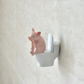 Comfortable Toilet Pet Pig Sitting on a Toilet Seat, Cute, Fun, Elegant, Toilet Pig Desk Accessory, Bathroom Decoration.
