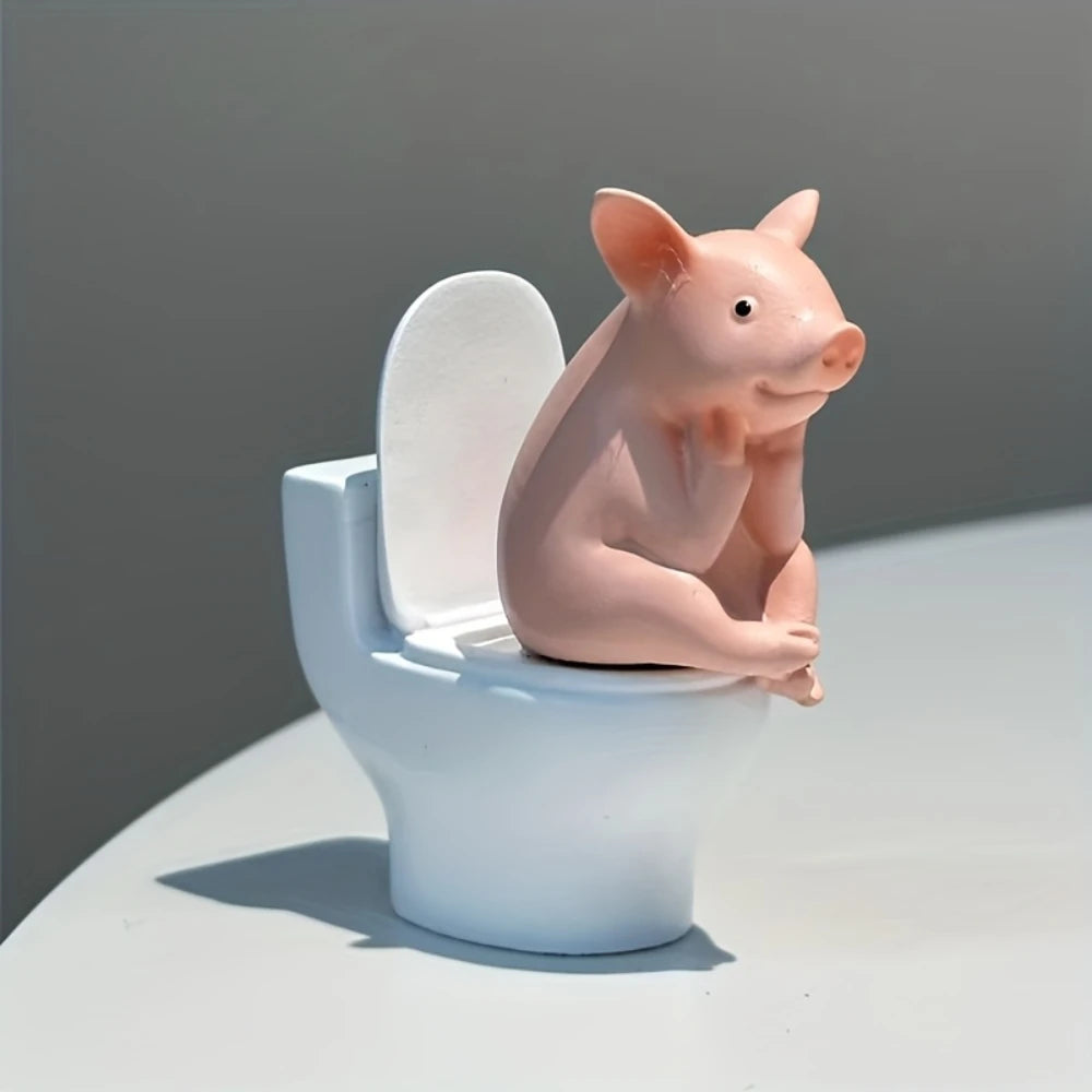 Comfortable Toilet Pet Pig Sitting on a Toilet Seat, Cute, Fun, Elegant, Toilet Pig Desk Accessory, Bathroom Decoration.