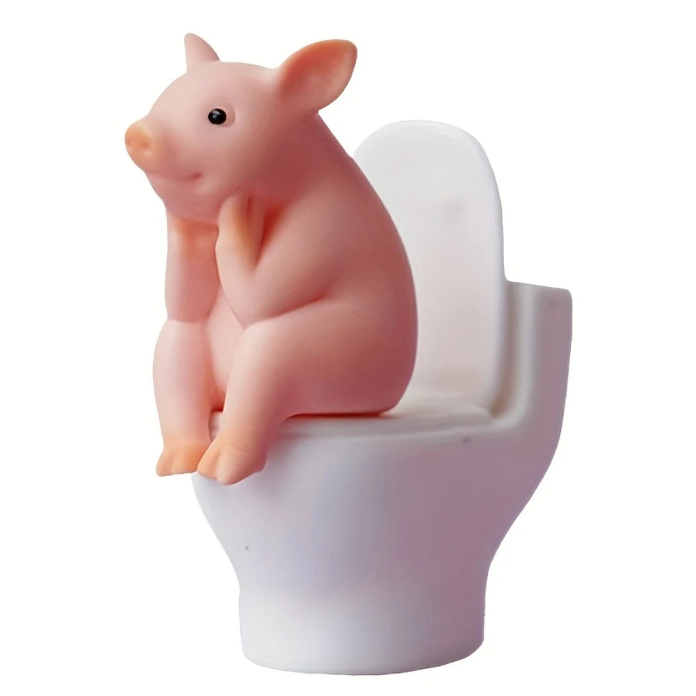 Comfortable Toilet Pet Pig Sitting on a Toilet Seat, Cute, Fun, Elegant, Toilet Pig Desk Accessory, Bathroom Decoration.